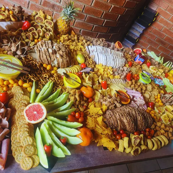 Harvest table with fruit, pineapple and savoury bites